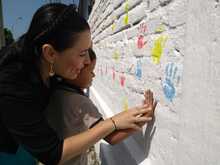 Con Mi Cali Bonita 223 ni&ntilde;os y ni&ntilde;as pintaron mural en los alrededores de la Alameda de Silo&eacute;
