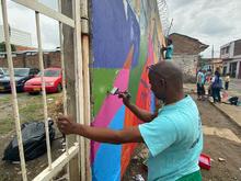 Cali ya tiene su Calle de la Alegr&iacute;a, la pintaron habitantes de calle en proceso de resocializaci&oacute;n