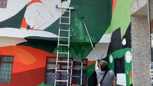 Mural de Infraestructura cautiva a propios y visitantes en el Bulevar de Oriente