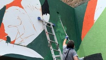 Mural de Infraestructura cautiva a propios y visitantes en el Bulevar de Oriente